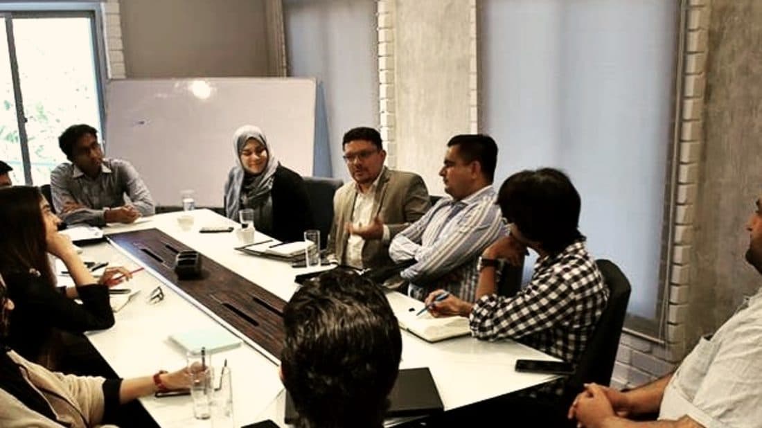 Corporate coaching session — mixed leadership group