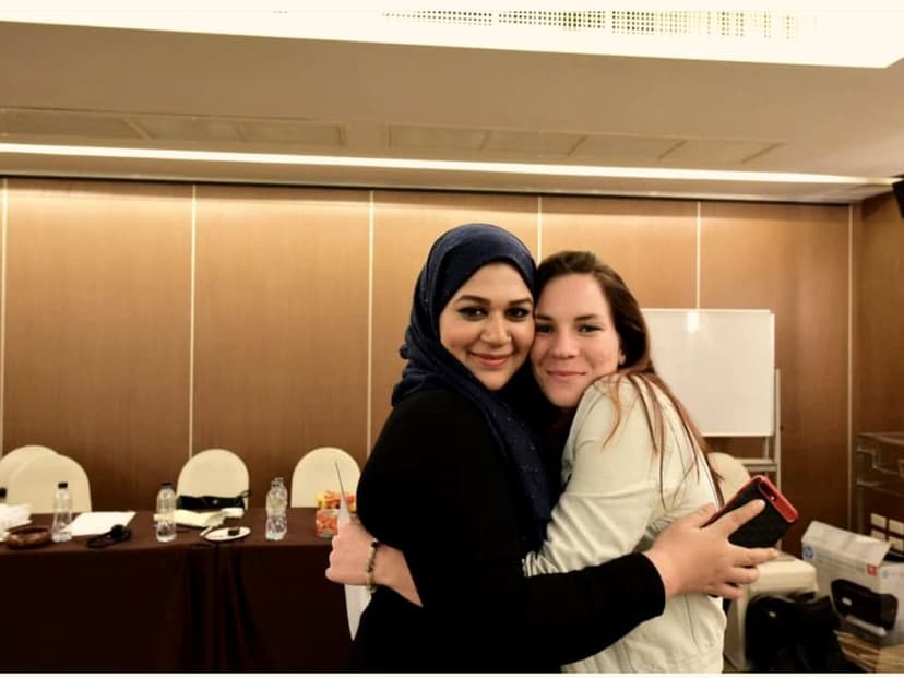 Marriam Ahmed with participant after international training