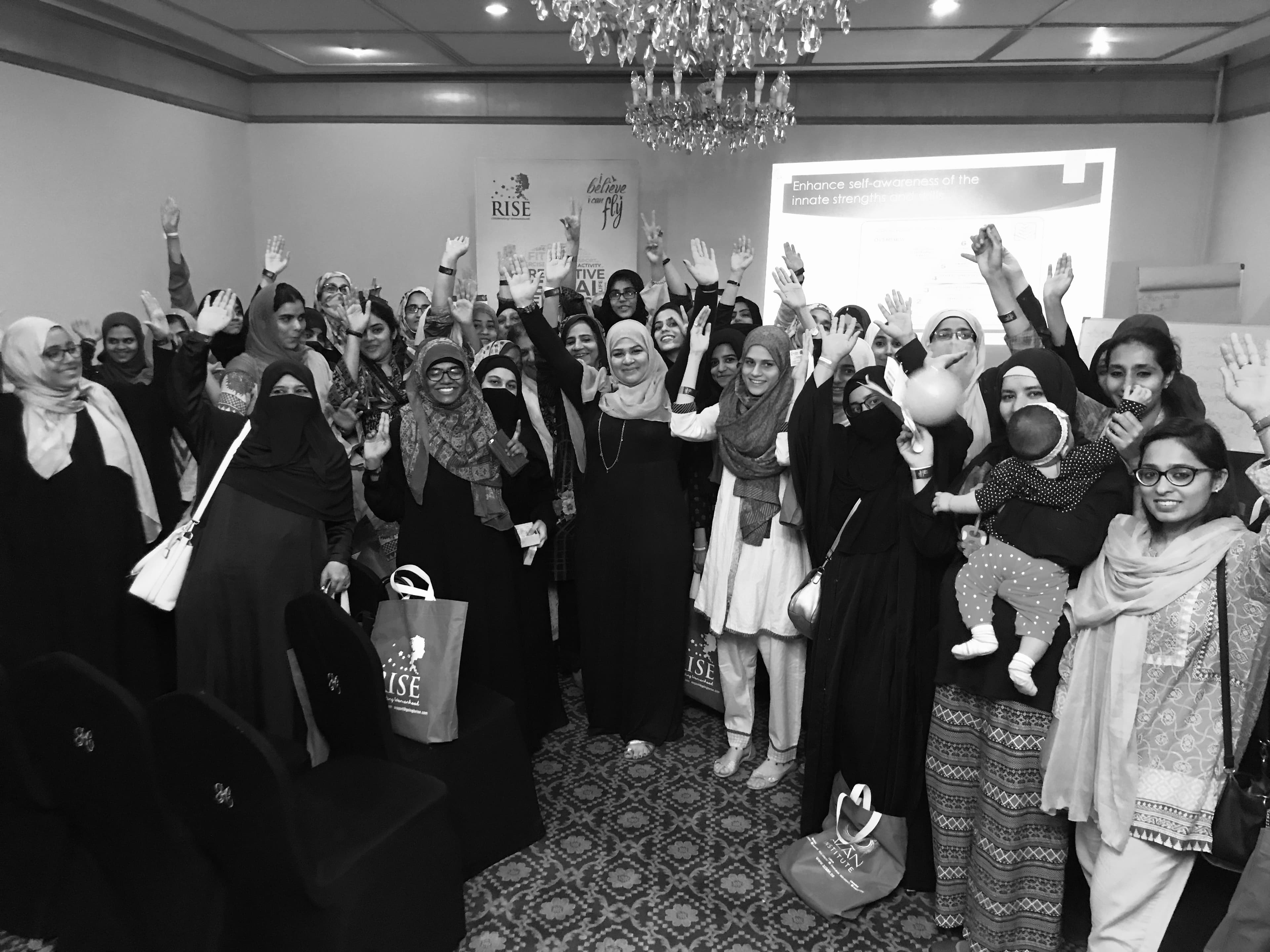 She Rises™ — Women's empowerment event